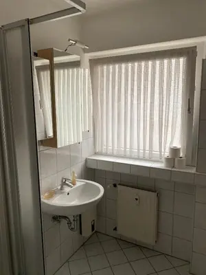 Ein Badezimmer in der Unterkunft City Center Apartment 44