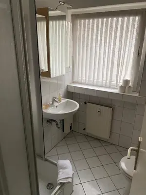 Ein Badezimmer in der Unterkunft City Center Apartment 44