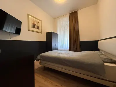 Ein Bett oder Betten in einem Zimmer der Unterkunft Cici Monteurunterkünfte Altena City Wohnung für Handwerker
