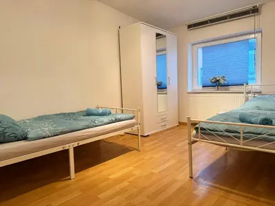 Ein Bett oder Betten in einem Zimmer der Unterkunft Scenic House in Solingen
