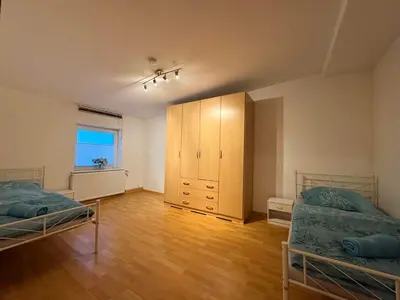 Ein Bett oder Betten in einem Zimmer der Unterkunft Scenic House in Solingen