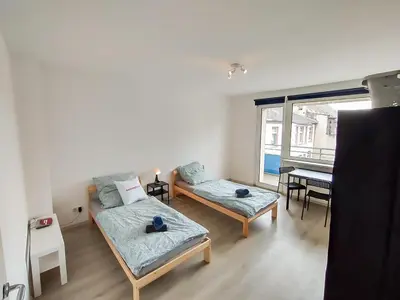 Ein Bett oder Betten in einem Zimmer der Unterkunft homes of ruhr - Monteurwohnung Halde