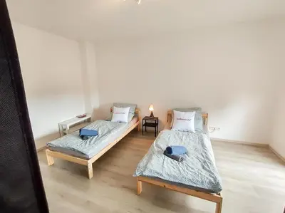 Ein Bett oder Betten in einem Zimmer der Unterkunft homes of ruhr - Monteurwohnung Halde