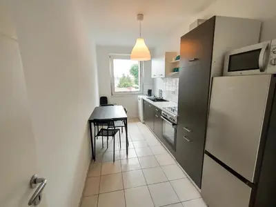 Küche/Küchenzeile in der Unterkunft homes of ruhr - Monteurwohnung Halde