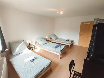 Ein Bett oder Betten in einem Zimmer der Unterkunft homes of ruhr - Monteurwohnung Stulle