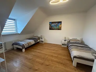 Ein Bett oder Betten in einem Zimmer der Unterkunft DERKO Apart 2