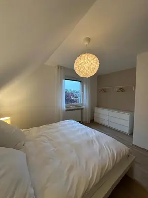 Ein Bett oder Betten in einem Zimmer der Unterkunft Moderne Ferienwohnung