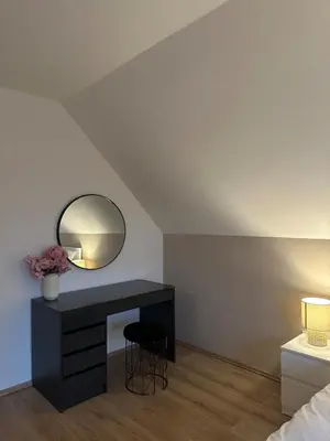 Ein Bett oder Betten in einem Zimmer der Unterkunft Moderne Ferienwohnung