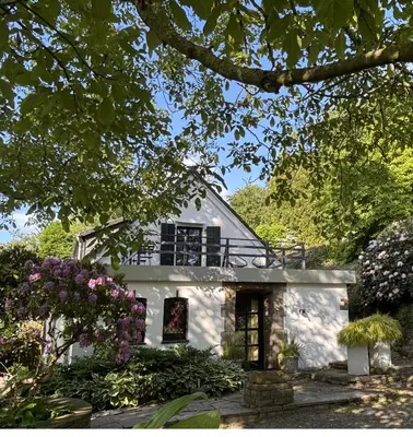 Ein Garten an der Unterkunft Wohnung im Grünen cottage33