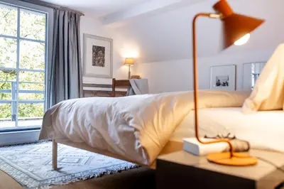 Ein Bett oder Betten in einem Zimmer der Unterkunft Wohnung im Grünen cottage33