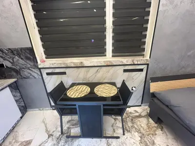 Ein für Gäste verfügbarer Grill in der Ferienwohnung