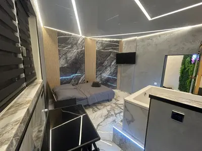 TV/Unterhaltungsangebot in der Unterkunft Wellness Suite Essen mit Whirlpool & Sauna