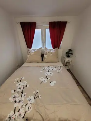 Ein Bett oder Betten in einem Zimmer der Unterkunft Geräumiges 2-Zimmer Apartment in Messenähe