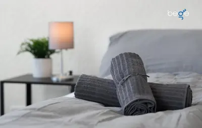 Ein Bett oder Betten in einem Zimmer der Unterkunft BEGE APARTMENTS SmartLiving