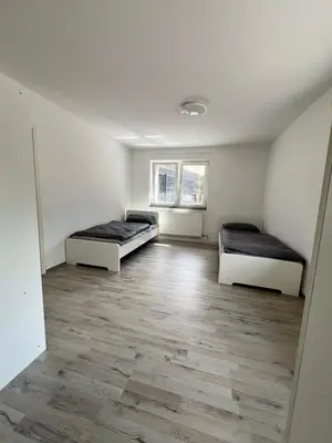 Ein Bett oder Betten in einem Zimmer der Unterkunft Ihr Zuhause in Herne Wohnen am Park