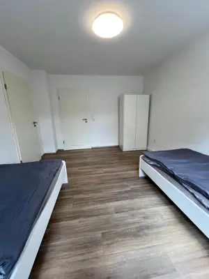 Ein Bett oder Betten in einem Zimmer der Unterkunft Ihr Zuhause in Herne Wohnen am Park
