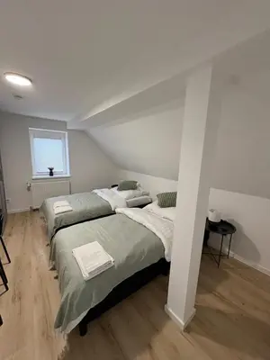Ein Bett oder Betten in einem Zimmer der Unterkunft Landhaus Marie