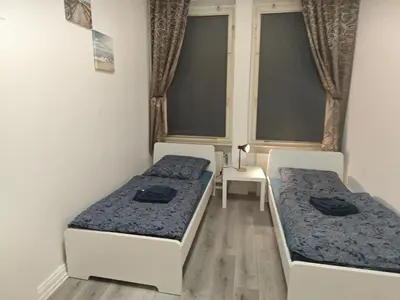 Ein Bett oder Betten in einem Zimmer der Unterkunft Work and Stay Lüdenscheid 8 Betten 4 Schlafzimmer 2 Duschen mit Billiard und Beamer