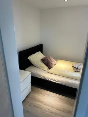 Ein Bett oder Betten in einem Zimmer der Unterkunft Skyview loft A1