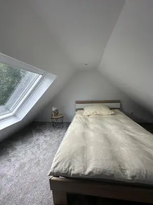 Ein Bett oder Betten in einem Zimmer der Unterkunft Skyview loft A1