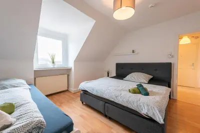 Ein Bett oder Betten in einem Zimmer der Unterkunft HagenStay Mittelstadt 1