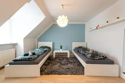 Ein Bett oder Betten in einem Zimmer der Unterkunft HagenStay Mittelstadt 1