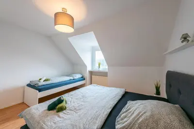 Ein Bett oder Betten in einem Zimmer der Unterkunft HagenStay Mittelstadt 1