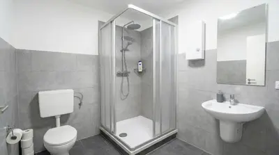 Ein Badezimmer in der Unterkunft L21-Apartment Dortmund, 2 Zimmer, 4 Betten, Standardisierte Ausstattung, ideal für Reisende, Pendler, Familien