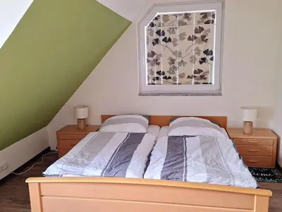 Ein Bett oder Betten in einem Zimmer der Unterkunft Marlerei