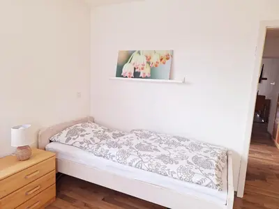 Ein Bett oder Betten in einem Zimmer der Unterkunft Marlerei
