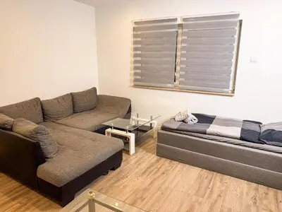 Ein Sitzbereich in der Unterkunft Ruhr Business Apartments Essen Apartment mit 8 Einzelbetten Privat Parkplatz