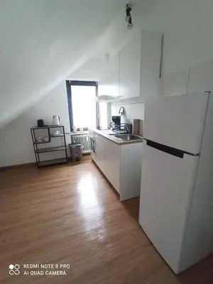 Küche/Küchenzeile in der Unterkunft Gemütliche Ferienwohnung mit großer Dachterasse in gehobener Wohngegend