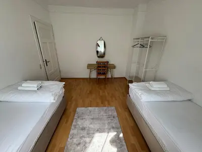 Ein Bett oder Betten in einem Zimmer der Unterkunft Apartment near OLG & University