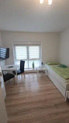 Ein Bett oder Betten in einem Zimmer der Unterkunft Komfortable Wohnung im Herzen des Ruhrpotts