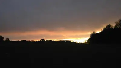 Blick auf den Sonnenuntergang/Sonnenaufgang von der Ferienwohnung aus oder aus der Nähe