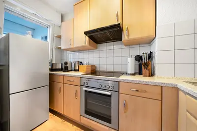 Küche/Küchenzeile in der Unterkunft Design-Wohnung I Balkon I sehr zentral I Küche