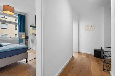 Ein Bett oder Betten in einem Zimmer der Unterkunft Moderne Suite bis zu 6 Personen - Central- free Parking - 3 Bedrooms - Netflix - Smart Home