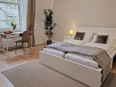 Ein Bett oder Betten in einem Zimmer der Unterkunft stayVision FS43 Wohnung 8 - 1 Schlafzimmer - 4 Gäste - top WLAN