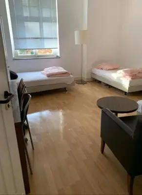 Ein Bett oder Betten in einem Zimmer der Unterkunft Hostel Apartment Monteurzimmer Solingen