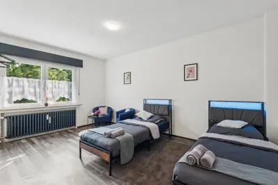Ein Bett oder Betten in einem Zimmer der Unterkunft Velbert, gute Lage, Ideal für Geschäftsleute, Monteure, Messegäste, 3 Schlafzimmer, SmartTV