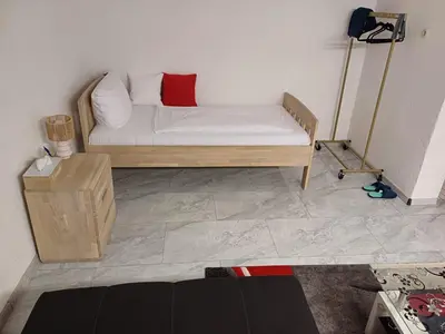 Ein Bett oder Betten in einem Zimmer der Unterkunft Guest house in Datteln