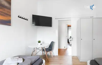 TV/Unterhaltungsangebot in der Unterkunft BEGE APARTMENTS Company Inn