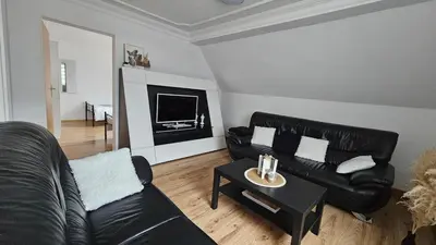 Ein Sitzbereich in der Unterkunft Eigene Wohnung und zentrale Lage
