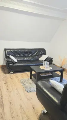 Ein Sitzbereich in der Unterkunft Eigene Wohnung und zentrale Lage