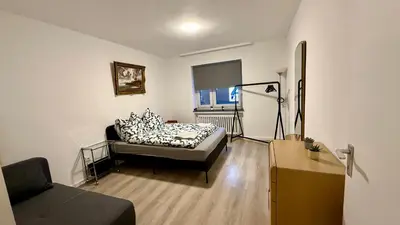 Ein Bett oder Betten in einem Zimmer der Unterkunft Wu Stay