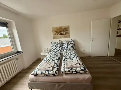 Ein Bett oder Betten in einem Zimmer der Unterkunft Wu Stay