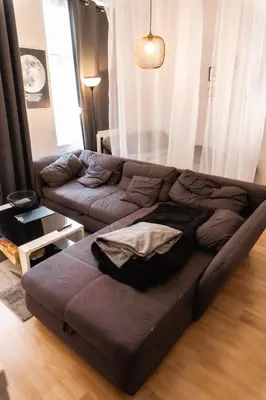 Ein Sitzbereich in der Unterkunft M House HA City Komfort Zimmer & Self Check-in