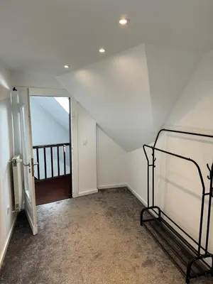 Ein Bett oder Betten in einem Zimmer der Unterkunft Nathanael Ferienwohnung mit Küche, WLAN & 4 Schlafzimmern