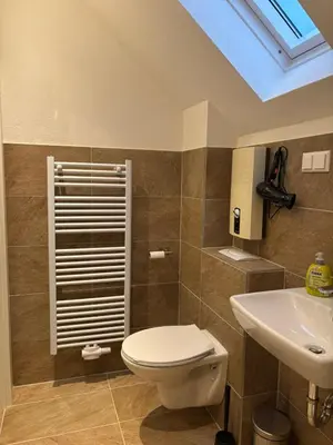 Ein Badezimmer in der Unterkunft Gemütliche Ferienwohnung mit eigenem Eingang am Speldorfer Wald