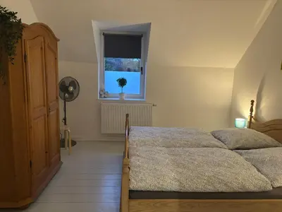 Ein Bett oder Betten in einem Zimmer der Unterkunft Gemütliche Ferienwohnung mit eigenem Eingang am Speldorfer Wald